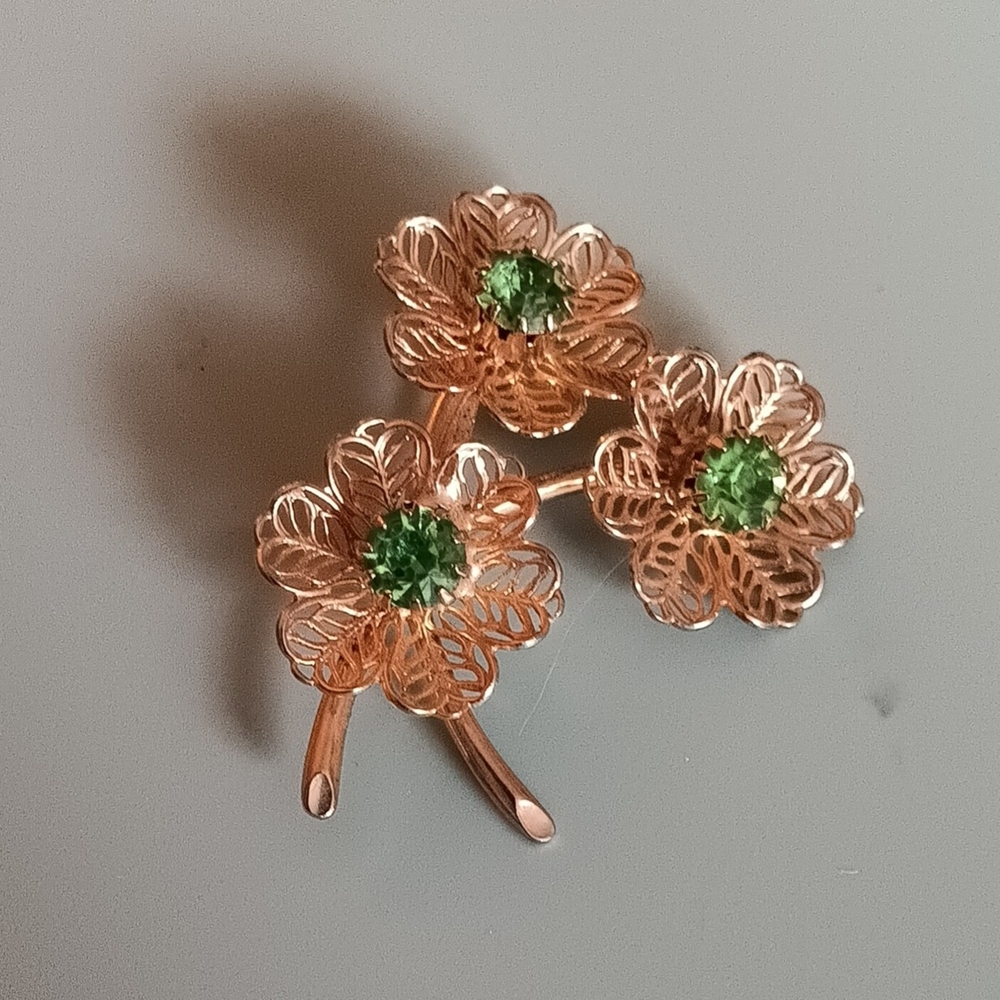Gold and Green Floral Brooch with Intricate Design